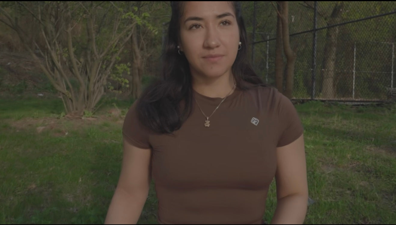 Load video: the video is of my EmpowerFit tops wearing the color Brown